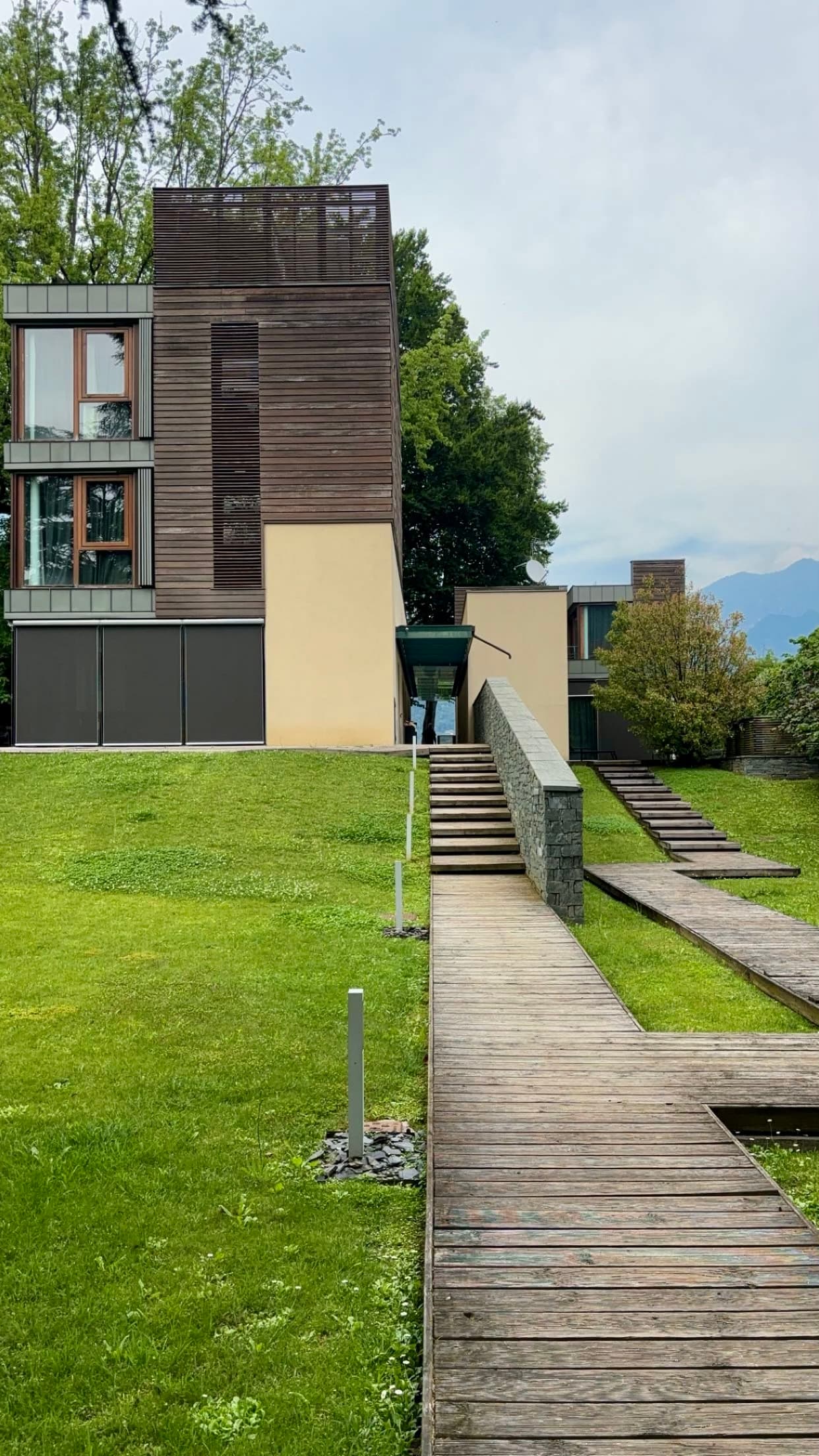 Modern architecture villa with a green lawn.