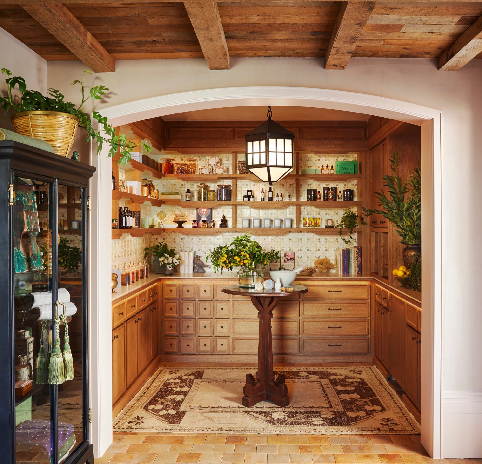 A chic modern apothecary with shelves displaying lotions and potions