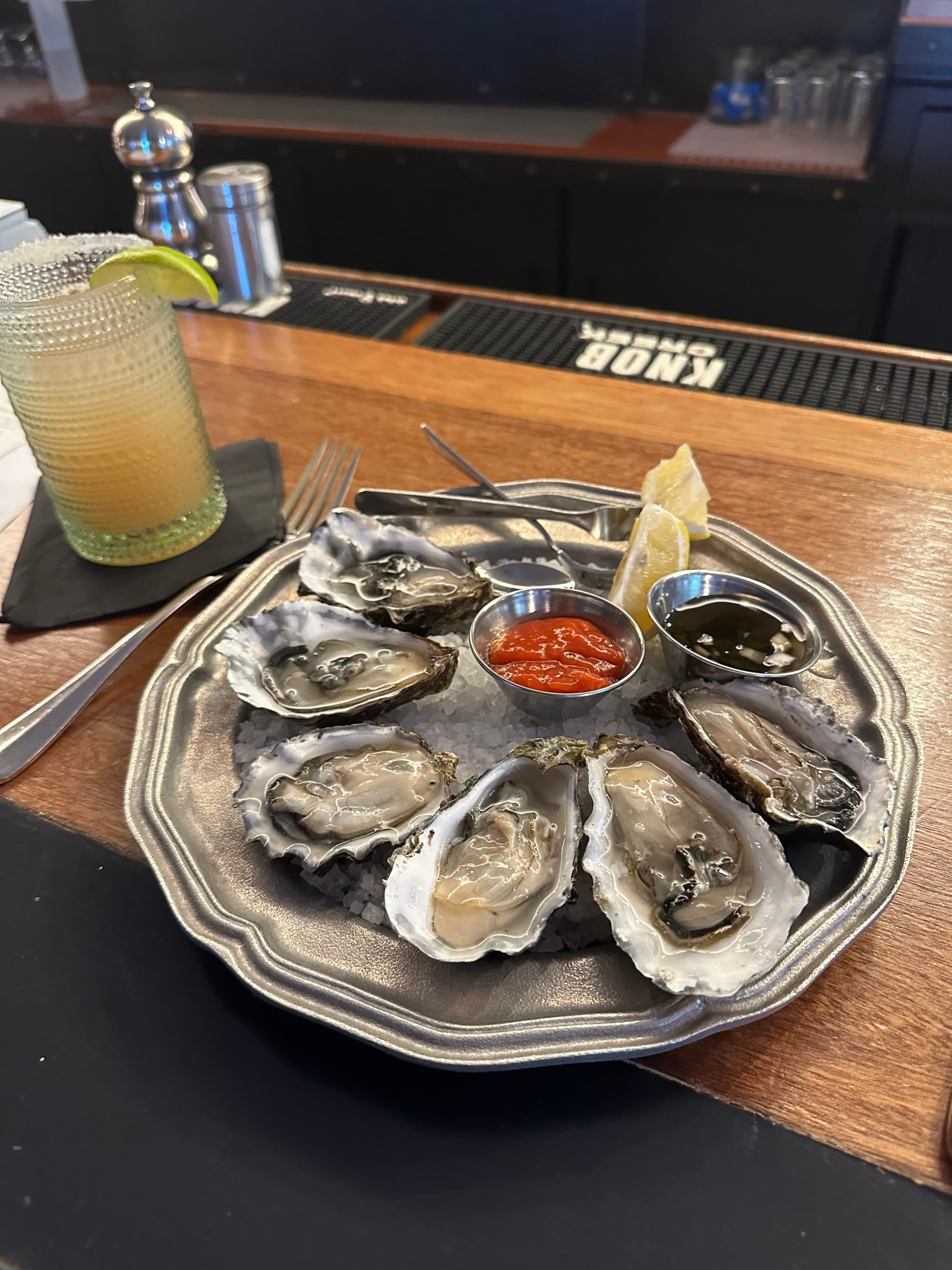 A tray of oysters on a table