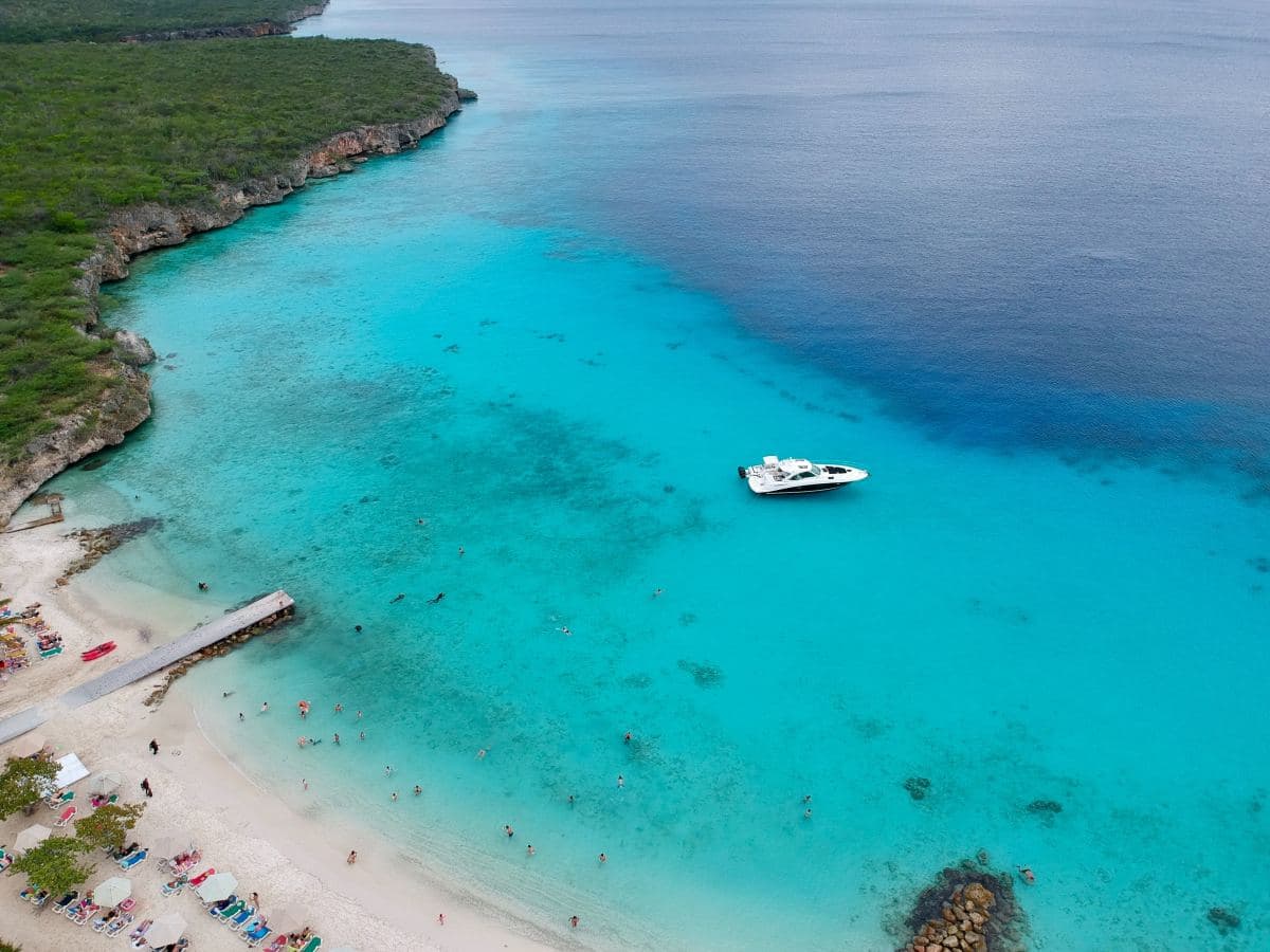 white boat on blue sea