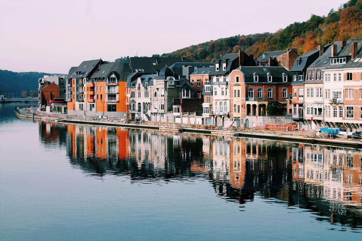 a view of buildings by the sea