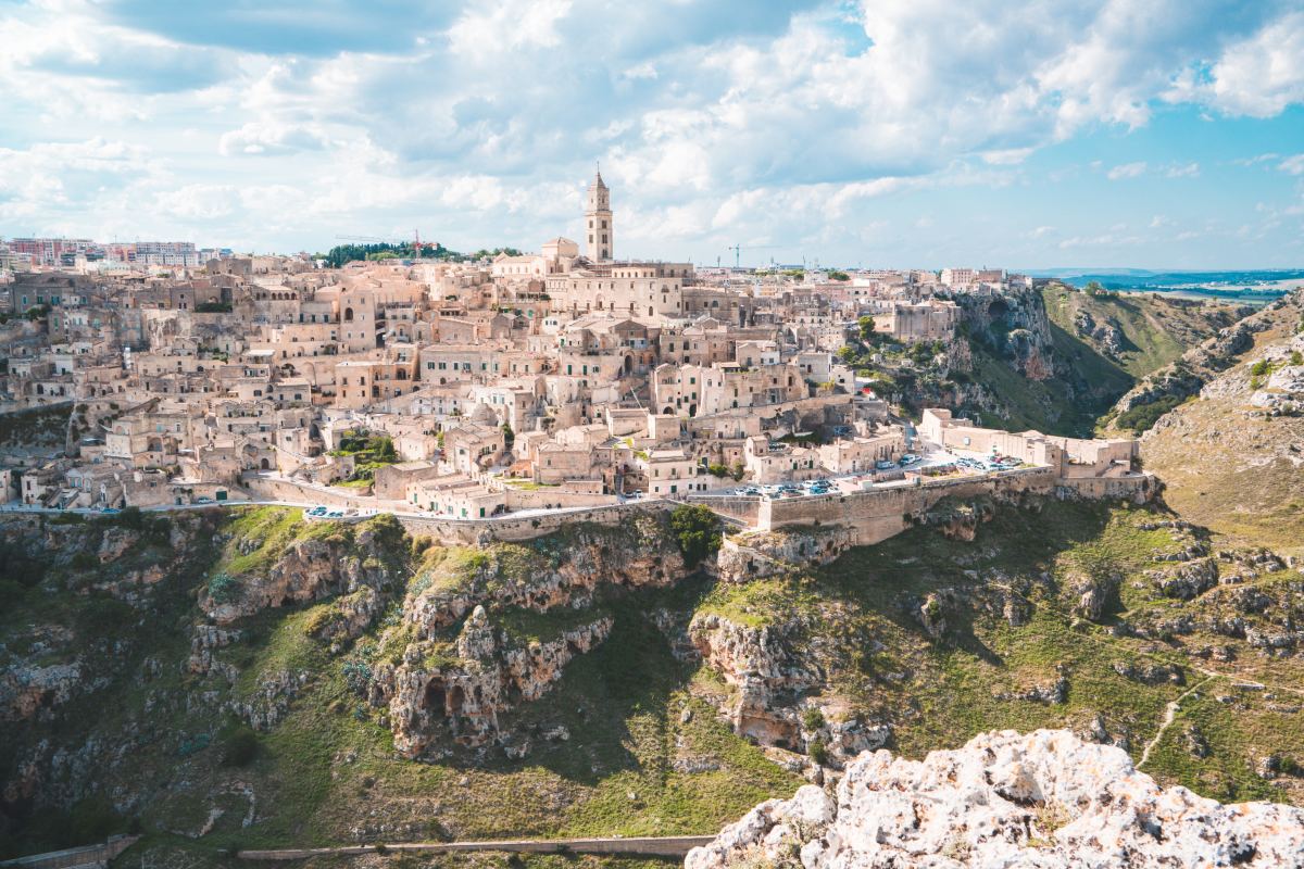 Buildings atop a hill during daytime