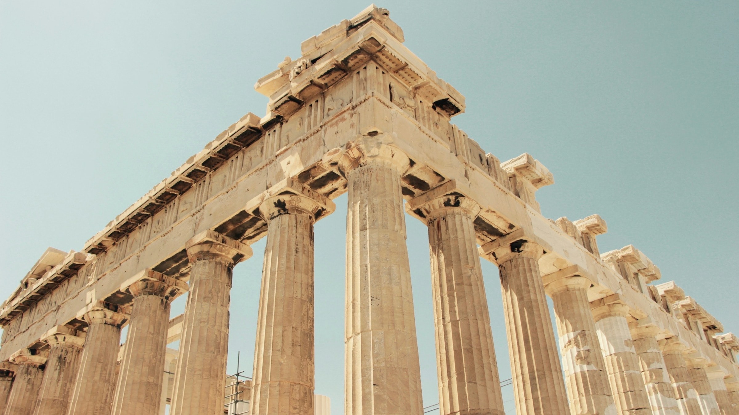 Low-angled view of a corner of the Acropolis with its many pillars