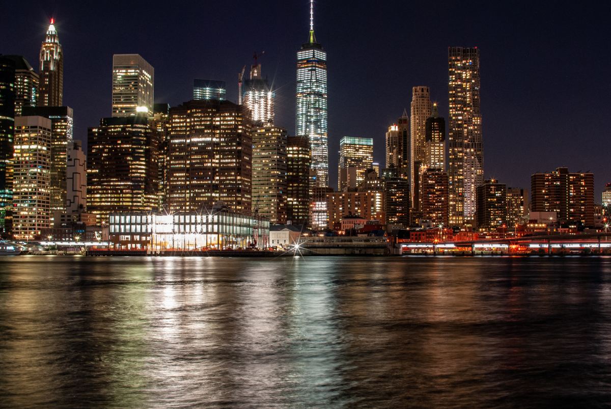 a view of downtown Manhattan at night