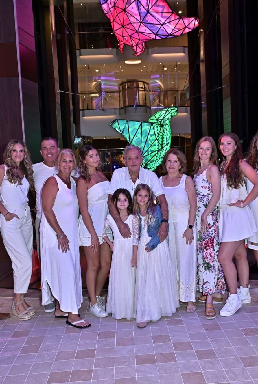 Family group photo onboard Utopia of the Sea.