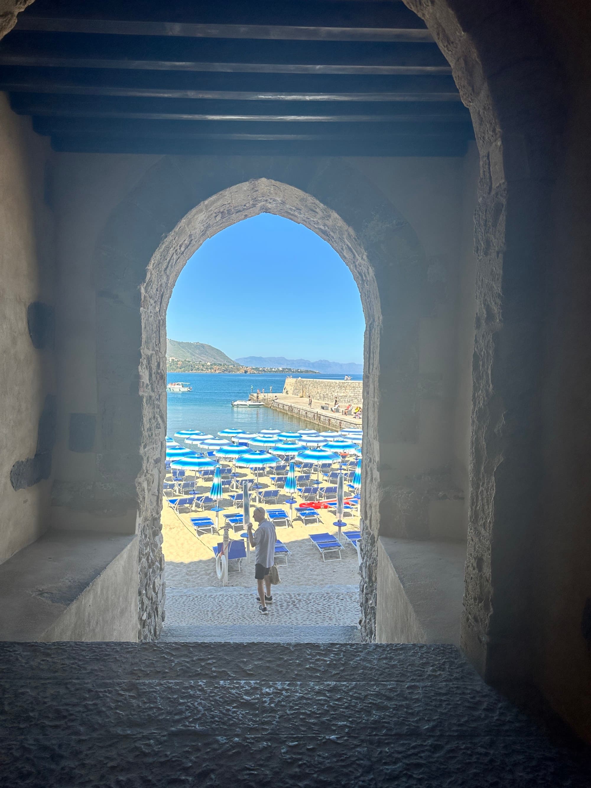Window looking out on to the ocean.
