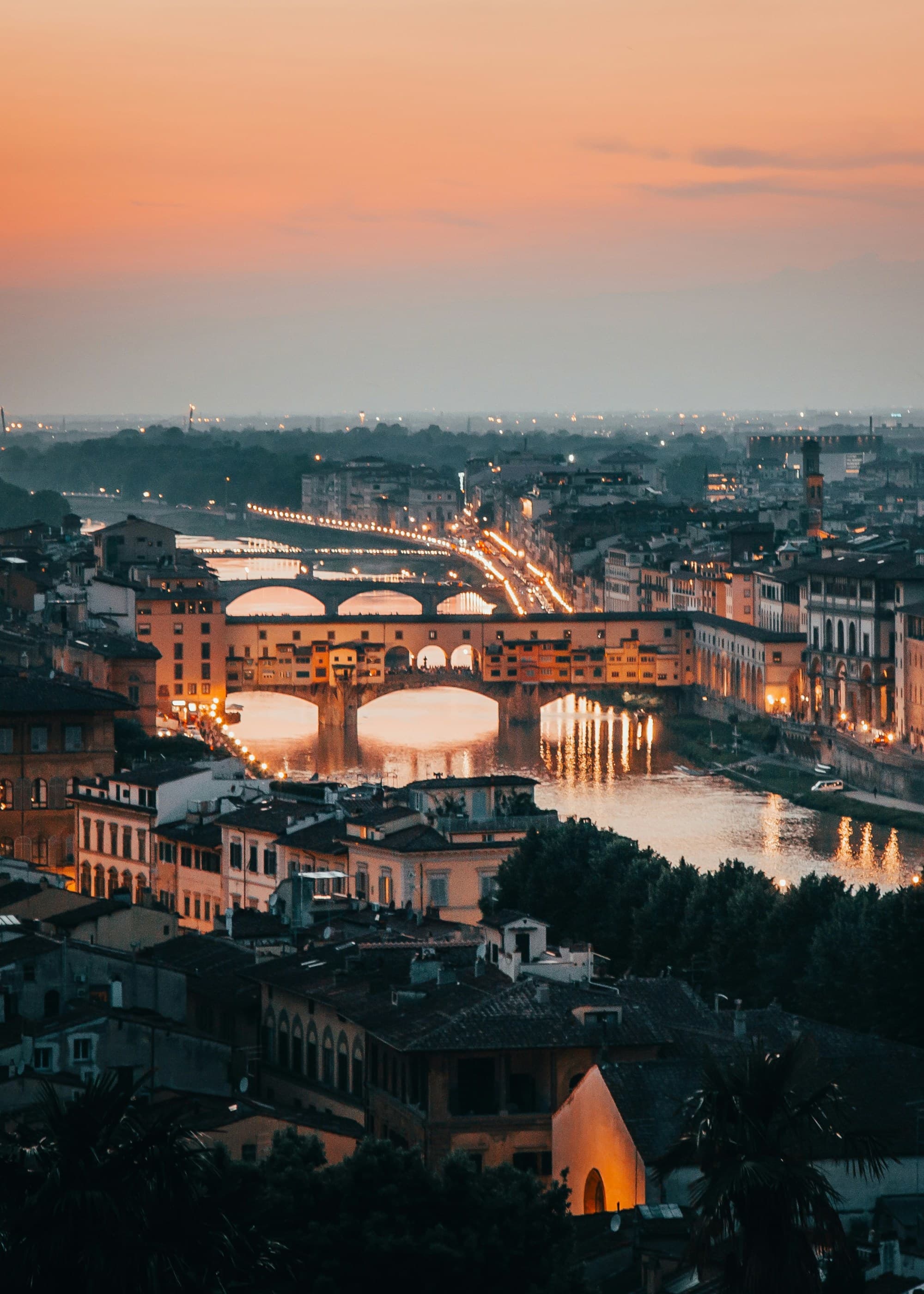 Bird's eye view of the city of Florence at dusk.