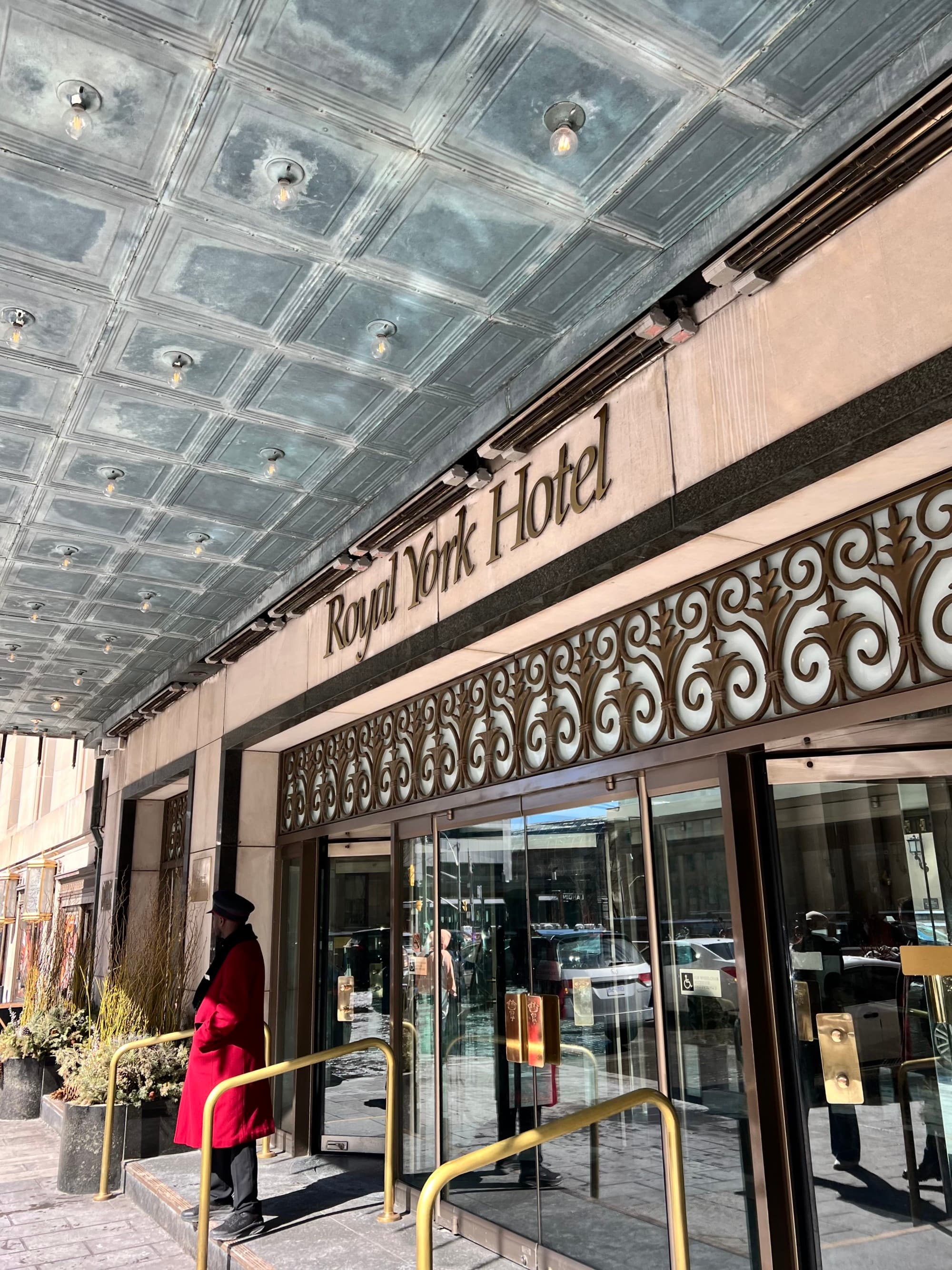 Elegant entrance of the Royal York Hotel with a bellman dresed in red