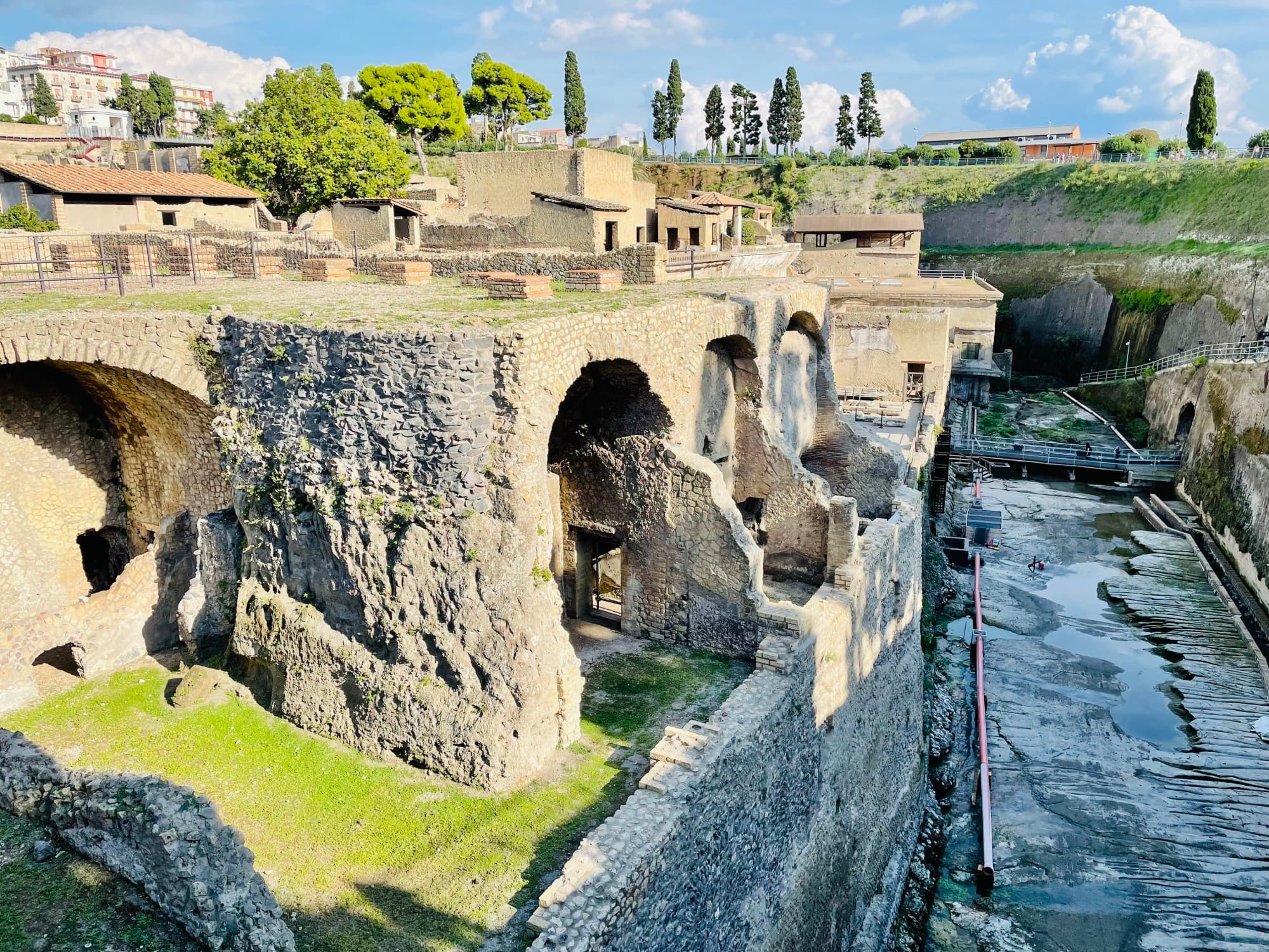 ancient structures beside a water stream