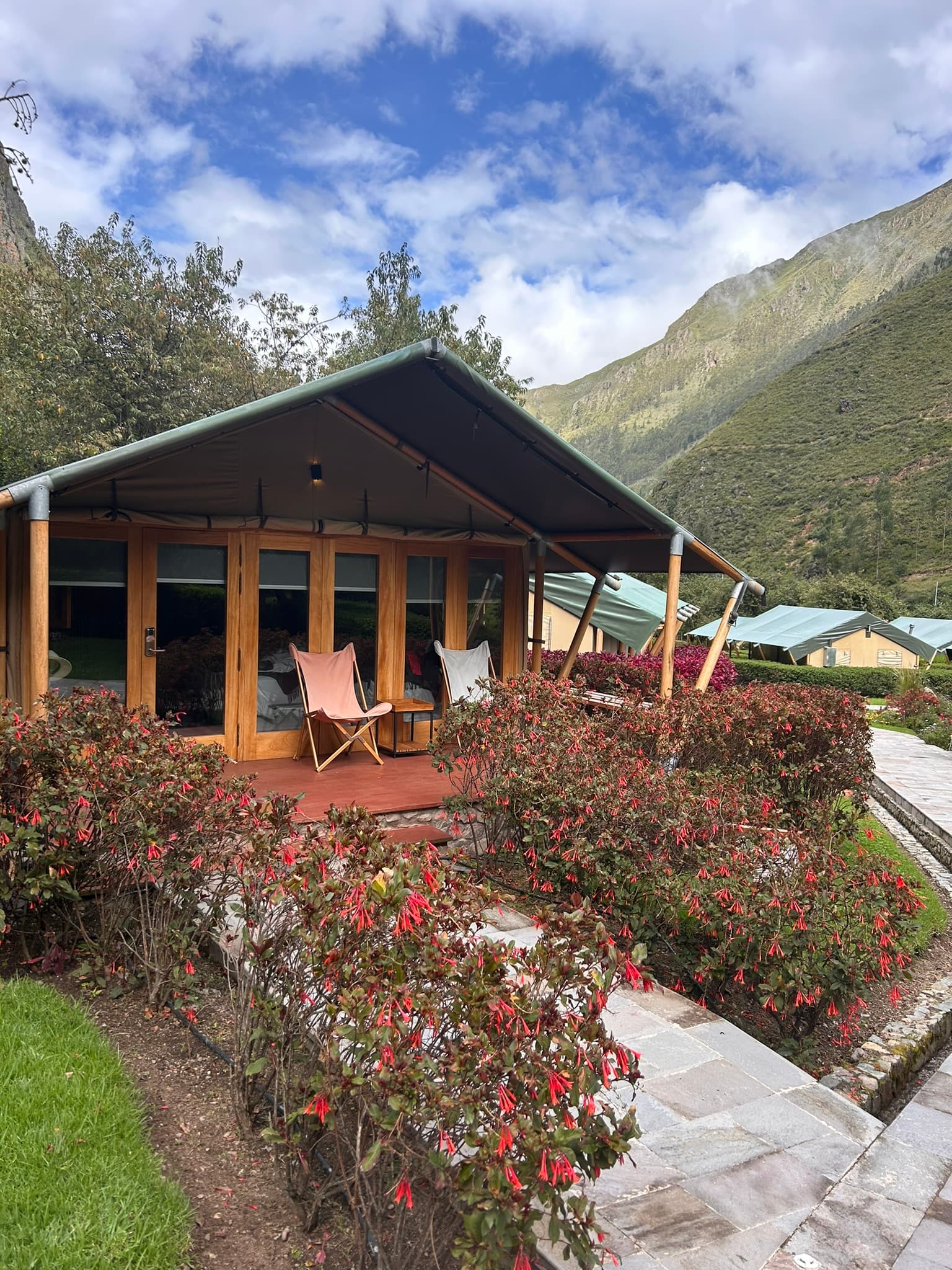 A cabin in a valley during the daytime