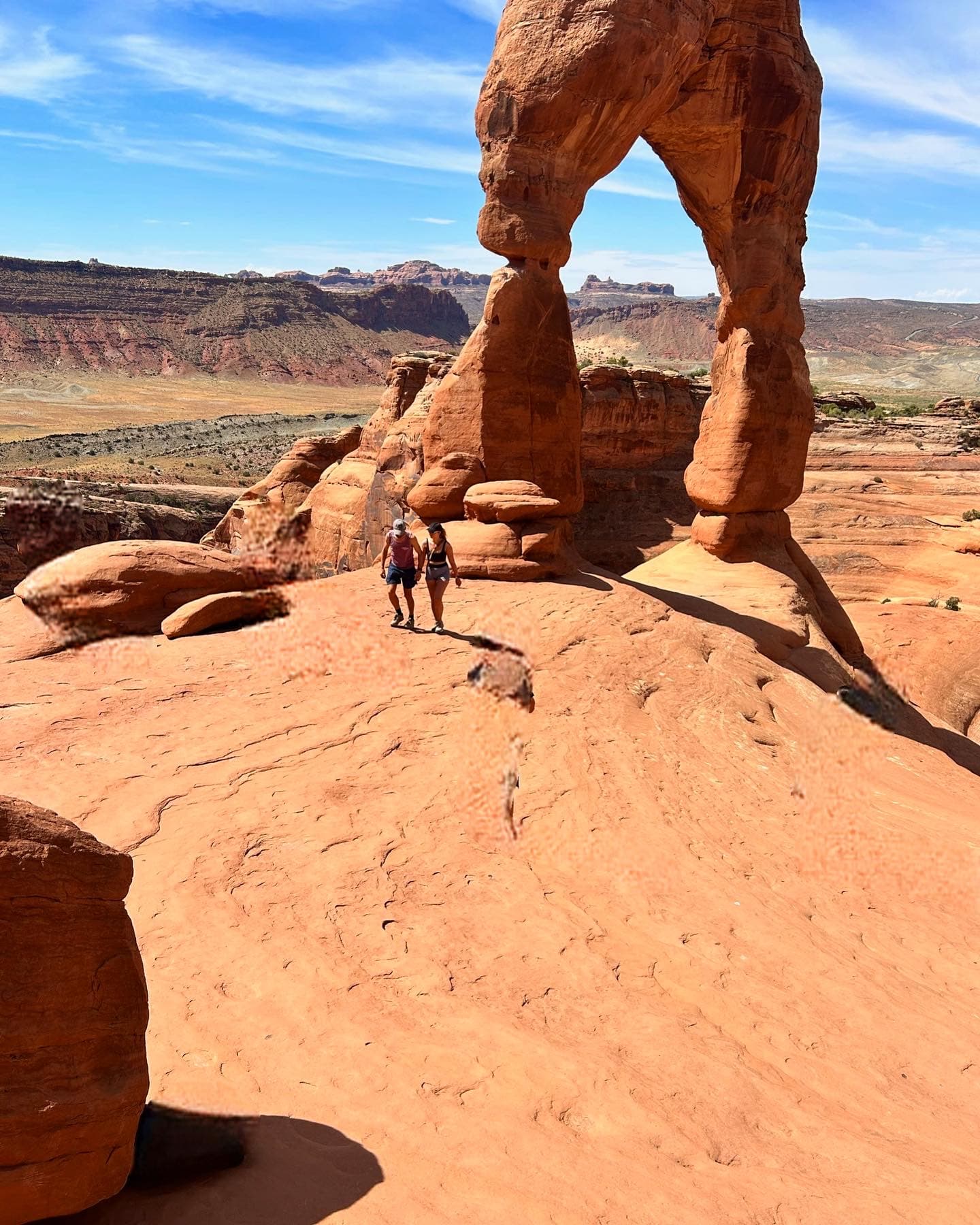 An arched rock formation during the daytime