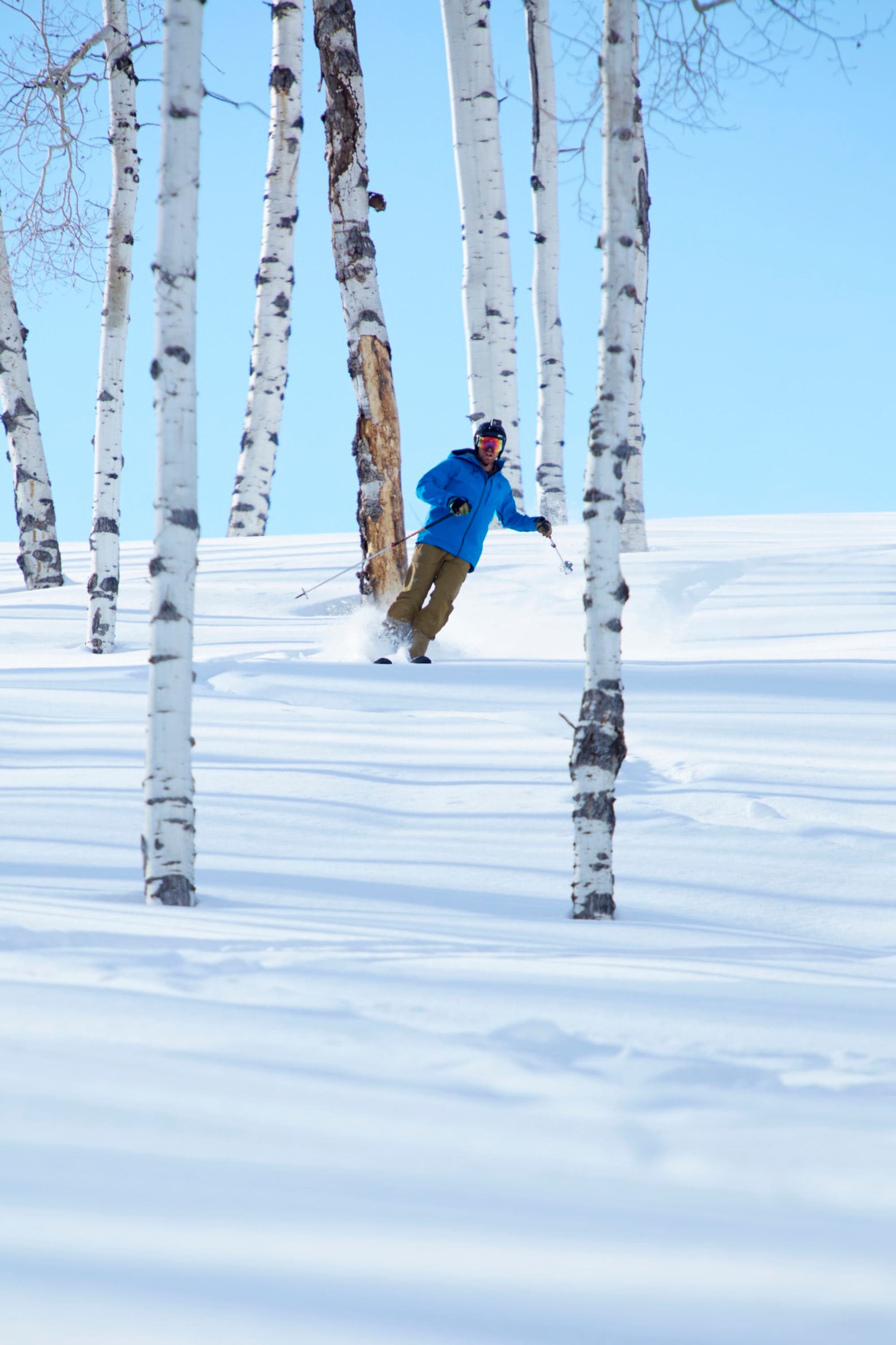 Travel advisor posing in a snowy region