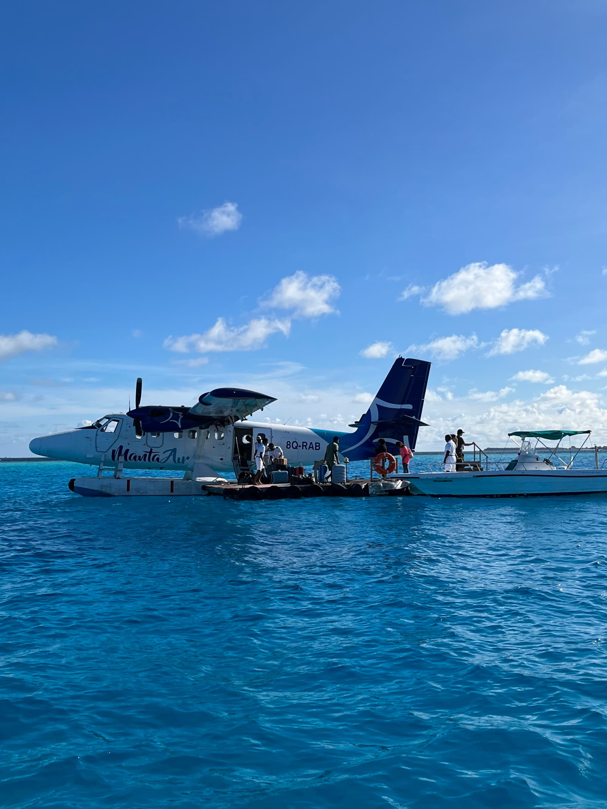 Sea, boats, and plane