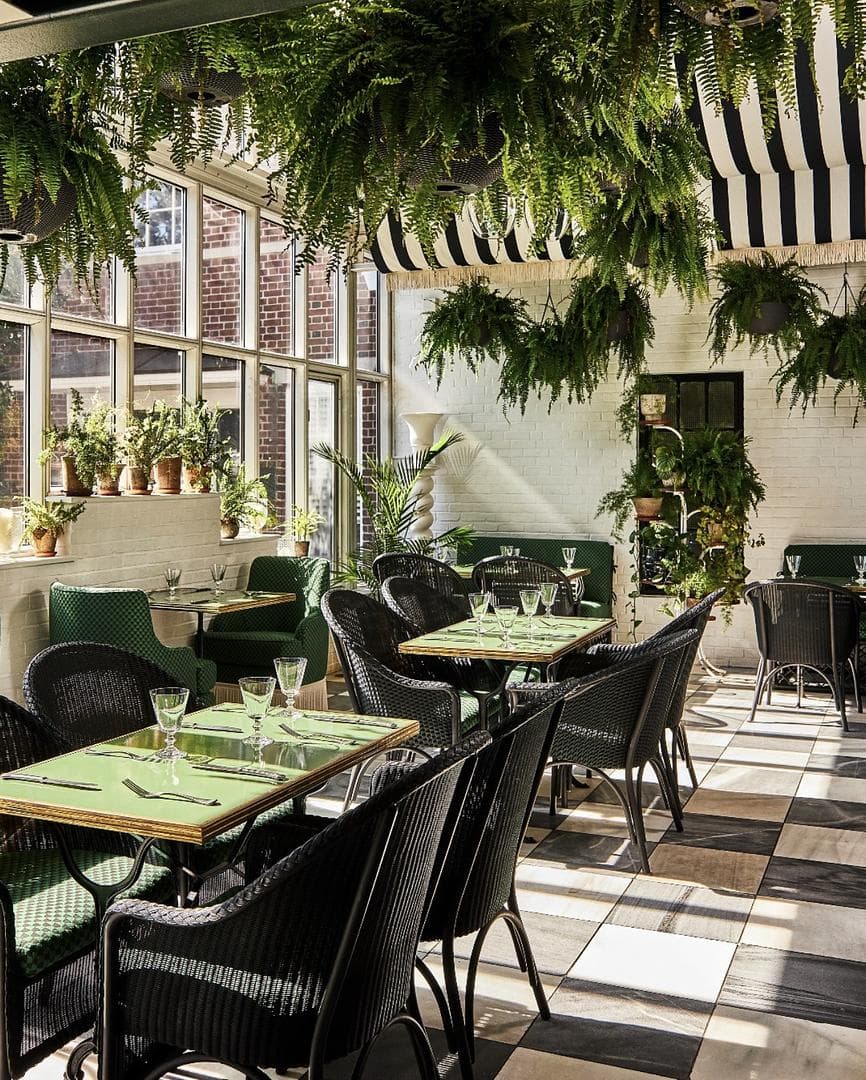 dinner area with green plants around