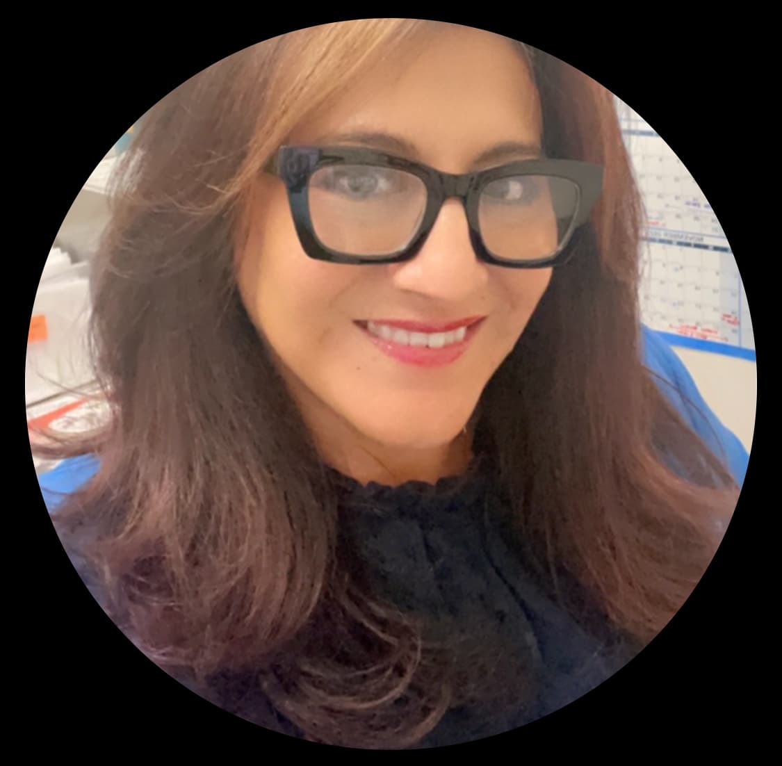 Travel advisor Lisa wearing black top and glasses