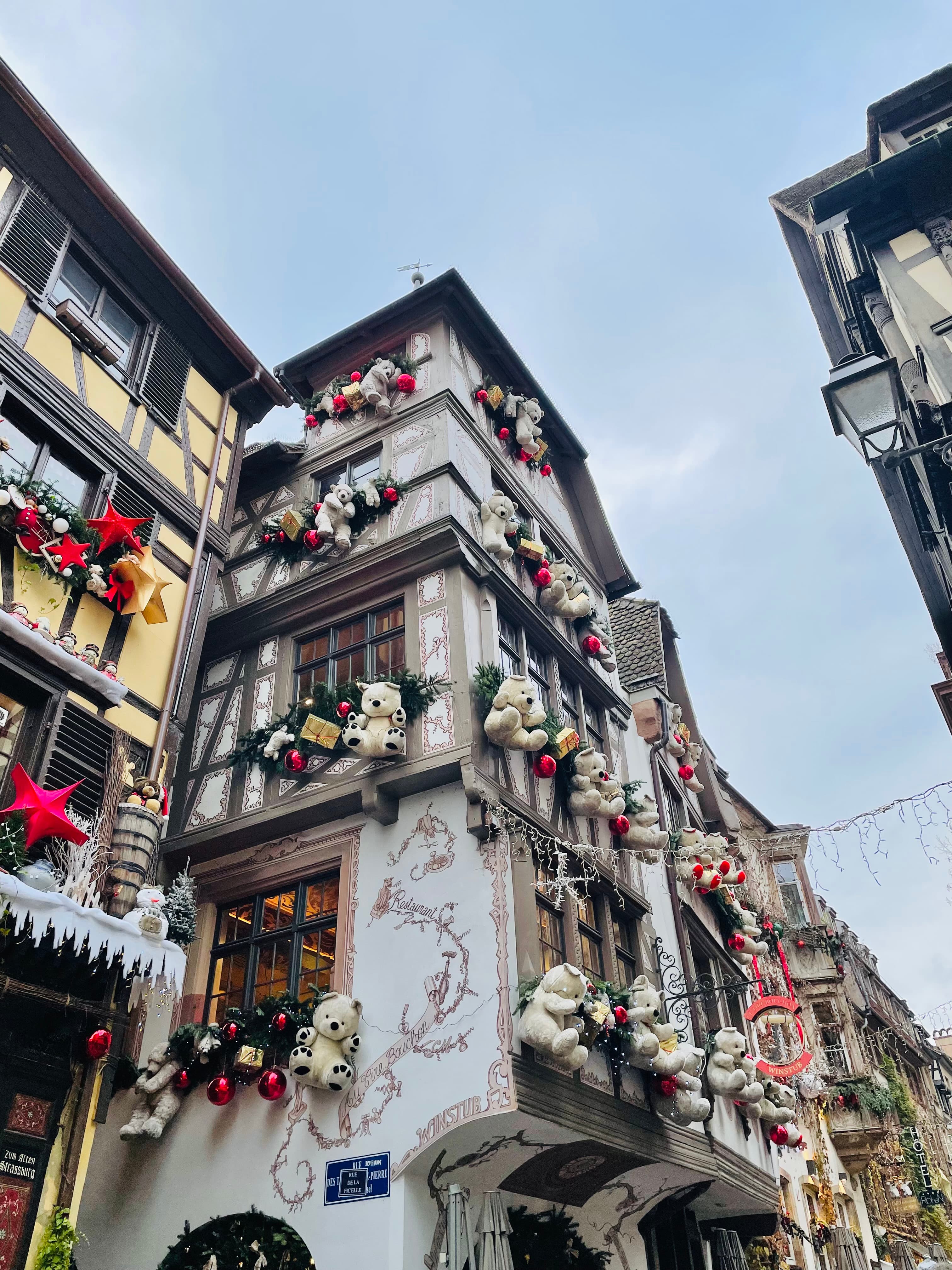 Windows of old buildings decorated for Christmas