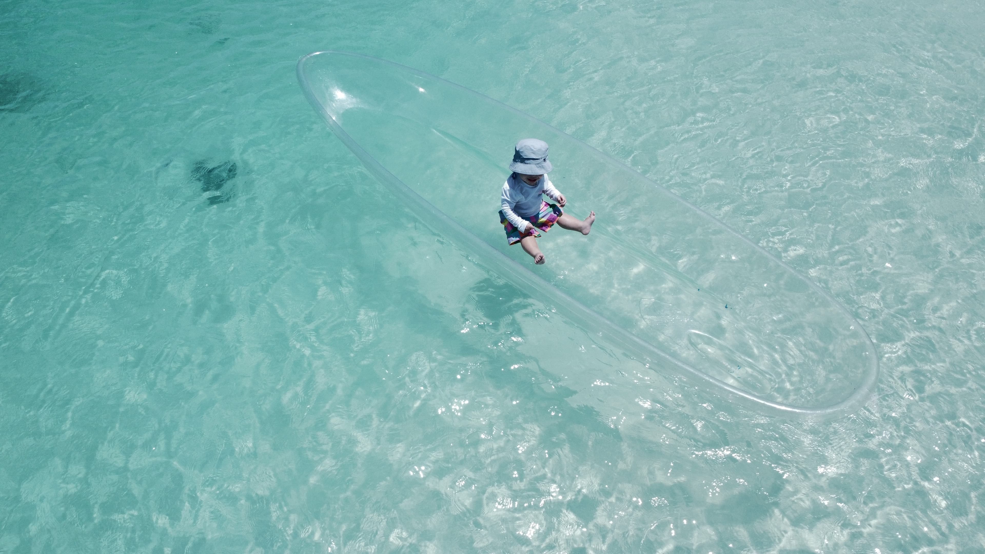 Baby on a clear boat
