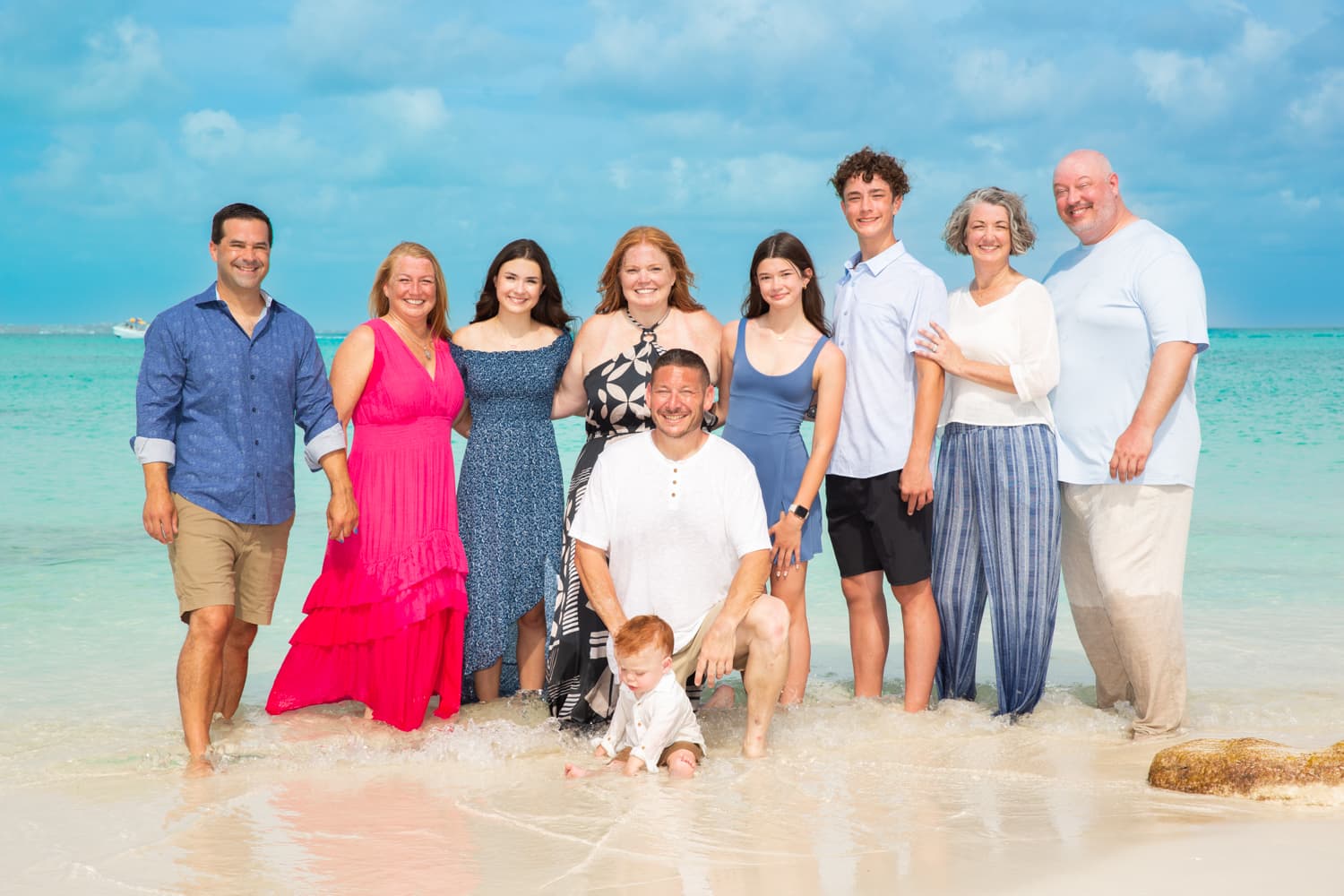 Posing for a family photo on the beach