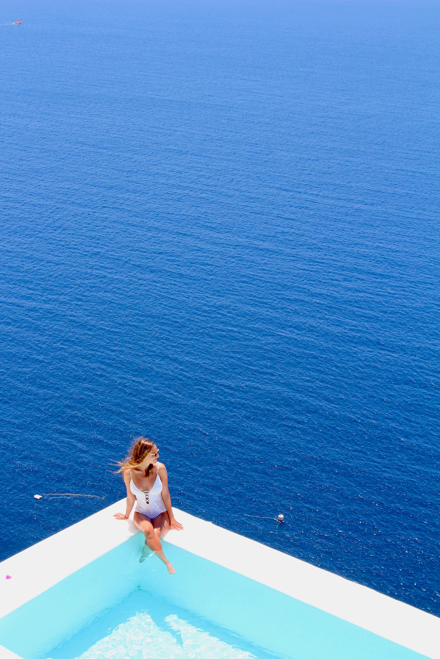Picture of Carly in pool with sea view