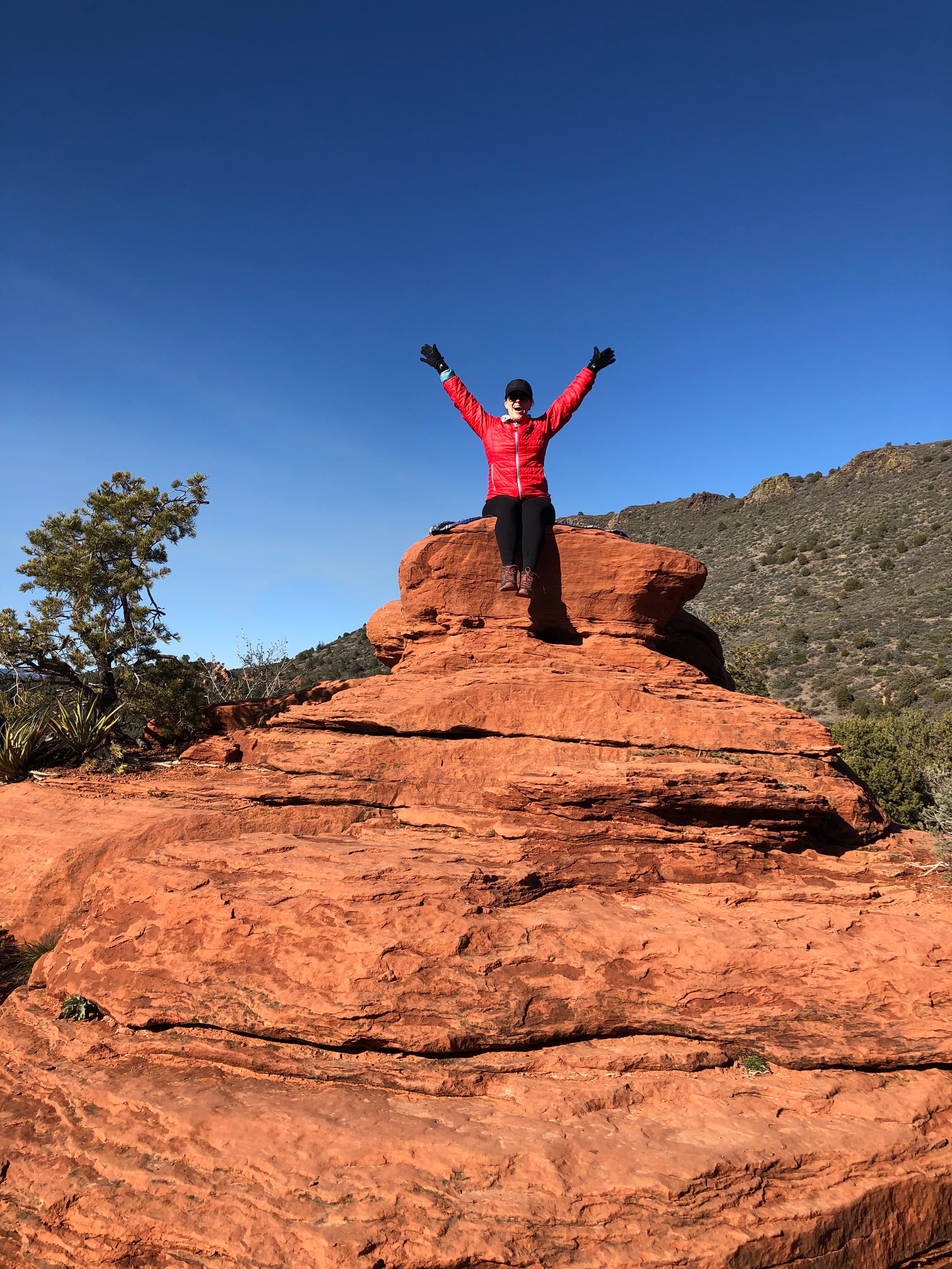 Picture of Hollie sitting on rock