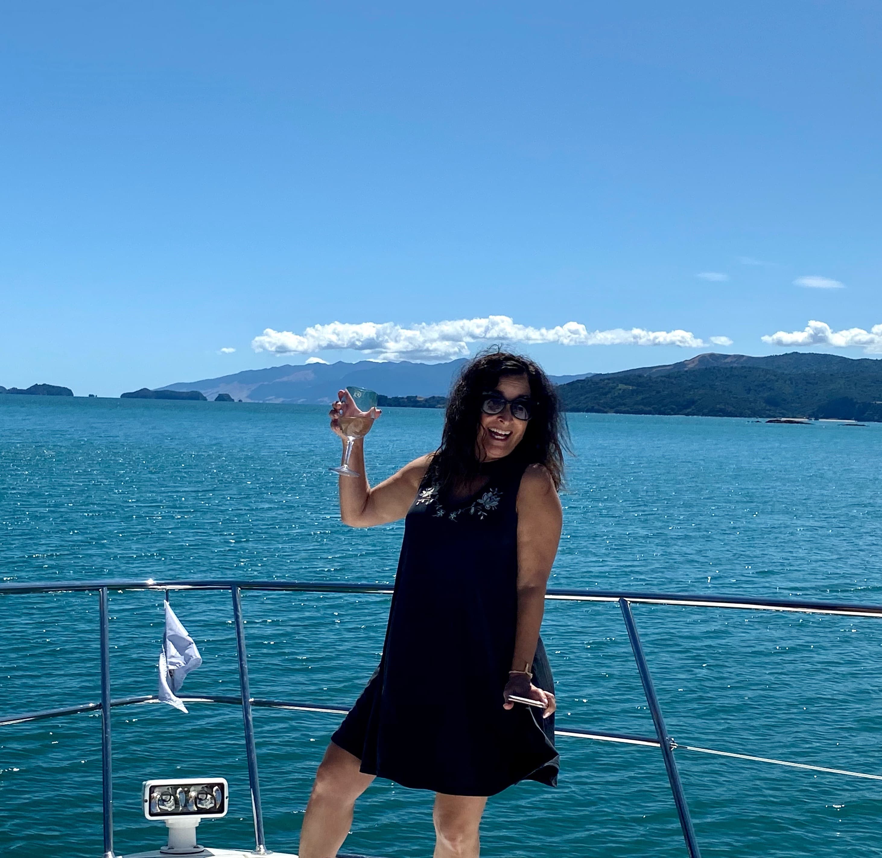 Picture of Elyse having a drink in boat