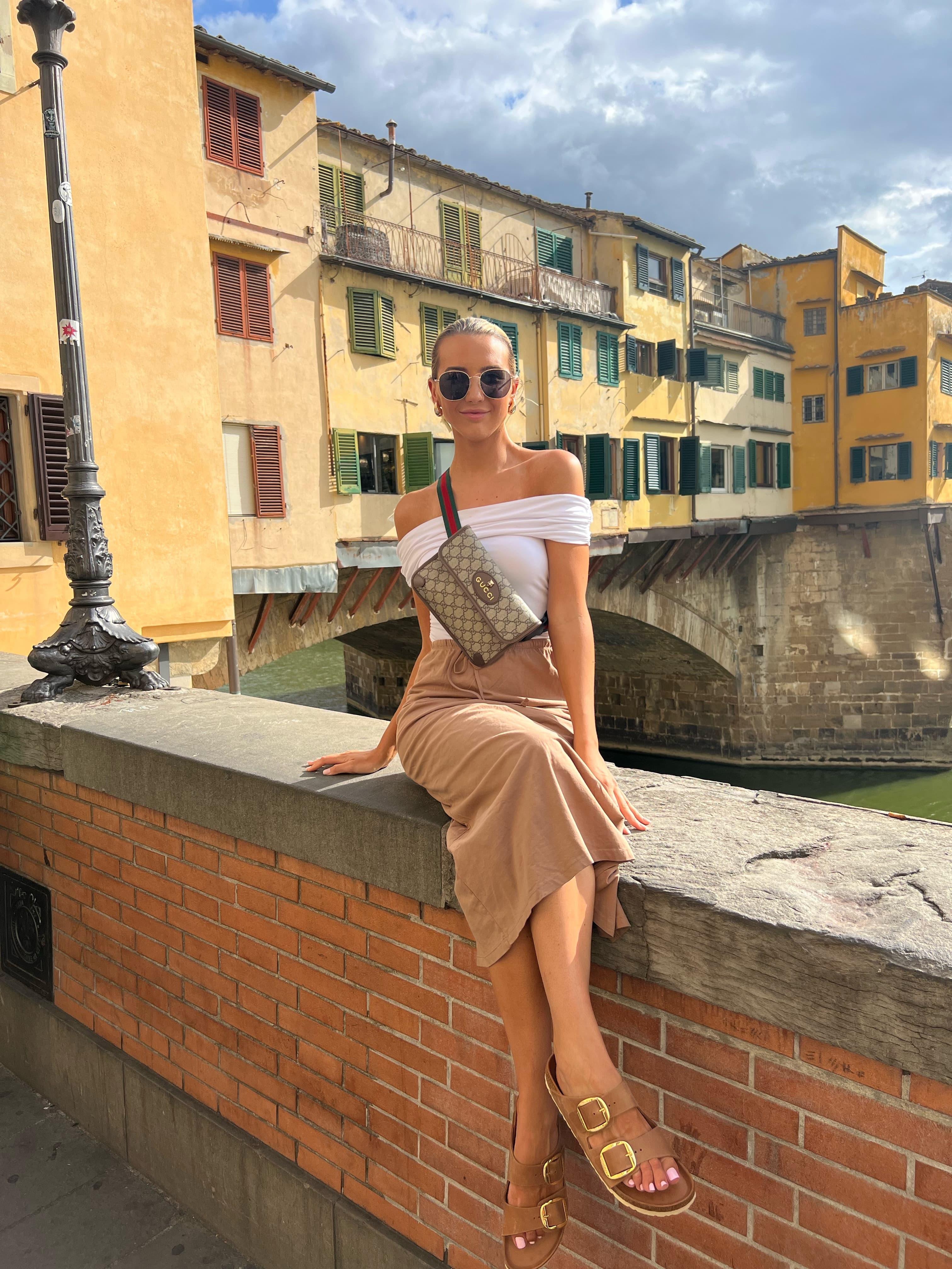 Sitting on a low wall