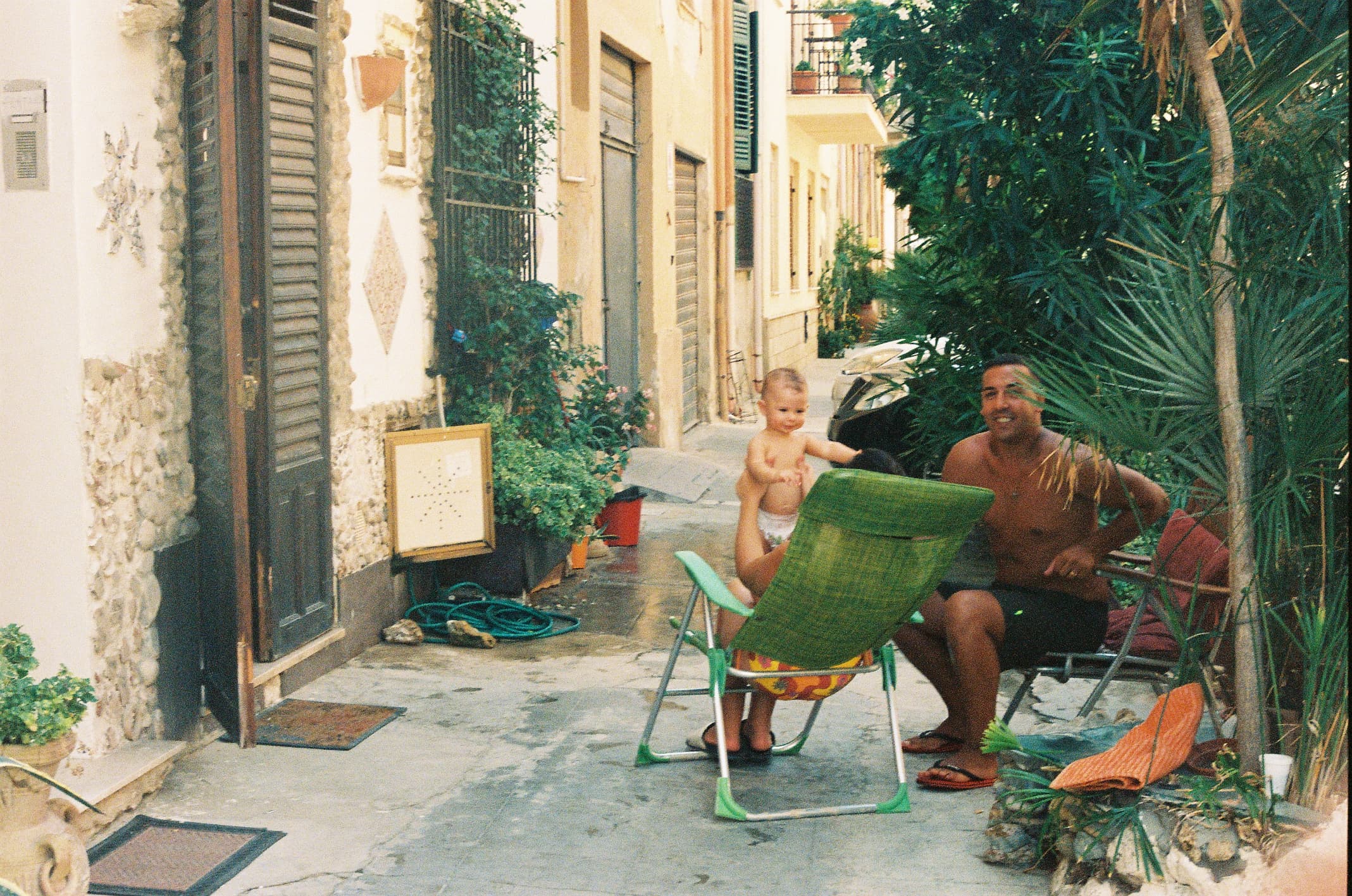 Picture of a family sitting outdoors
