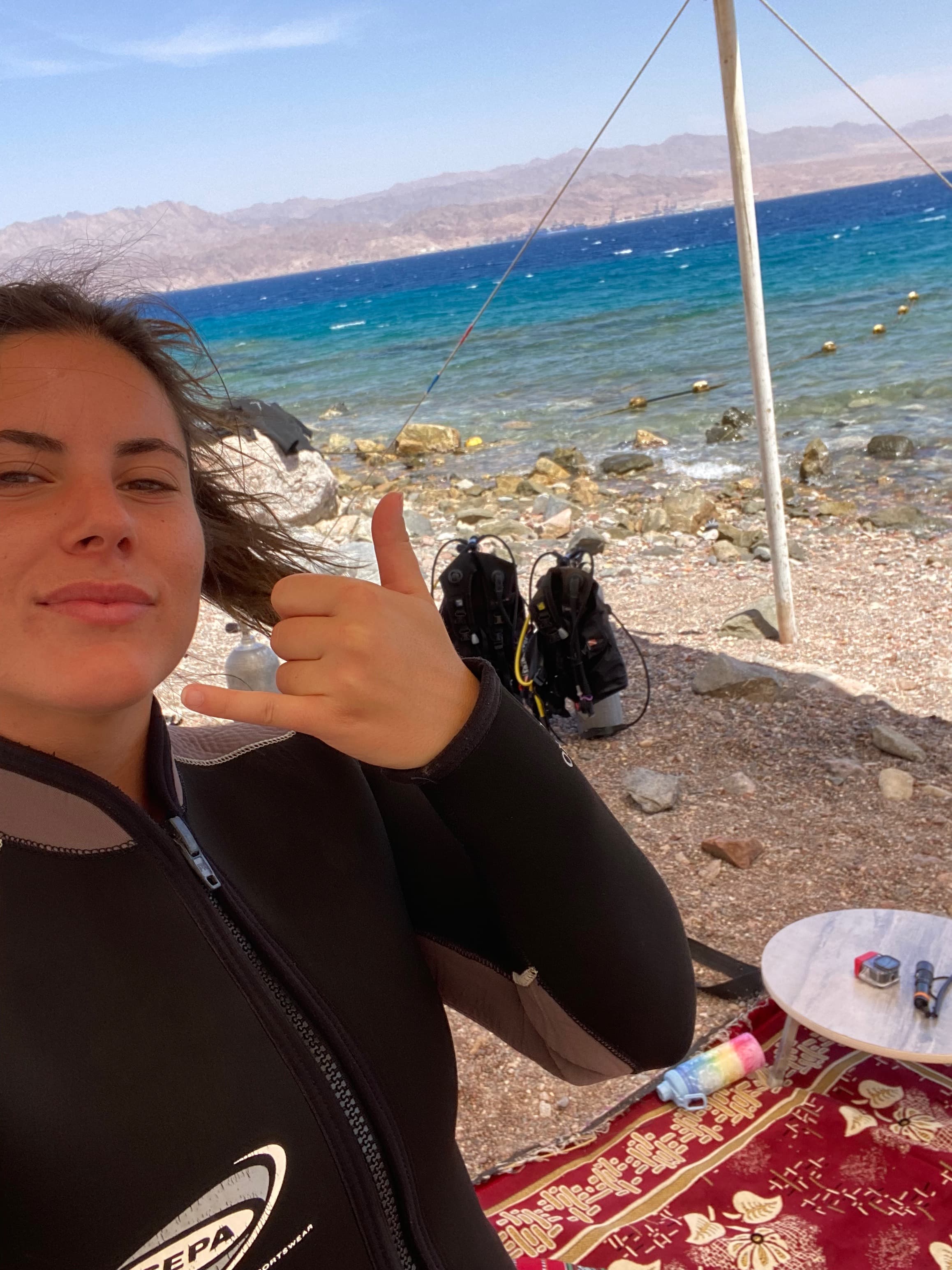 Wearing a scuba suit