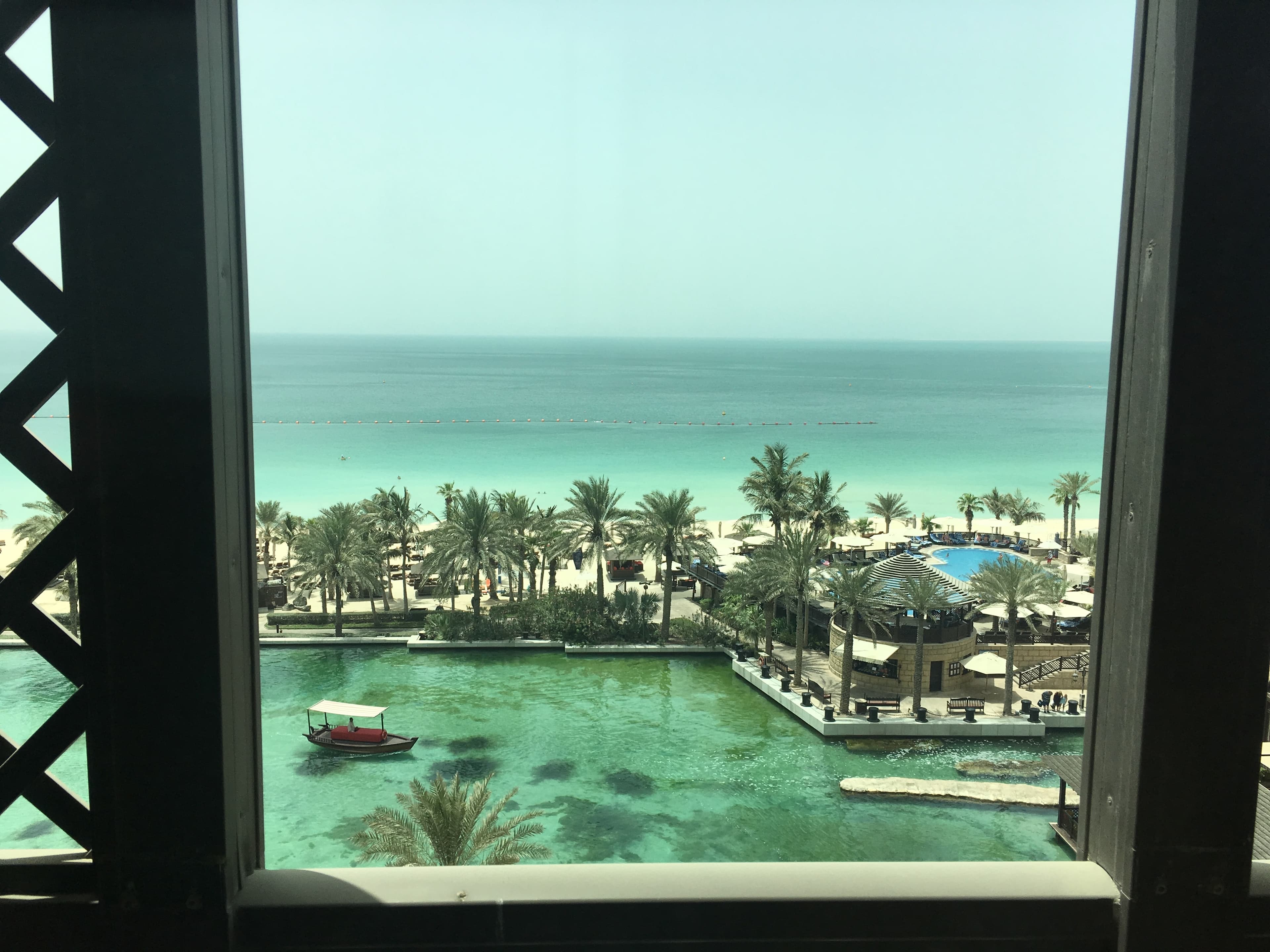 A beautiful view of Madinat Jumeirah resort hotel along the sea