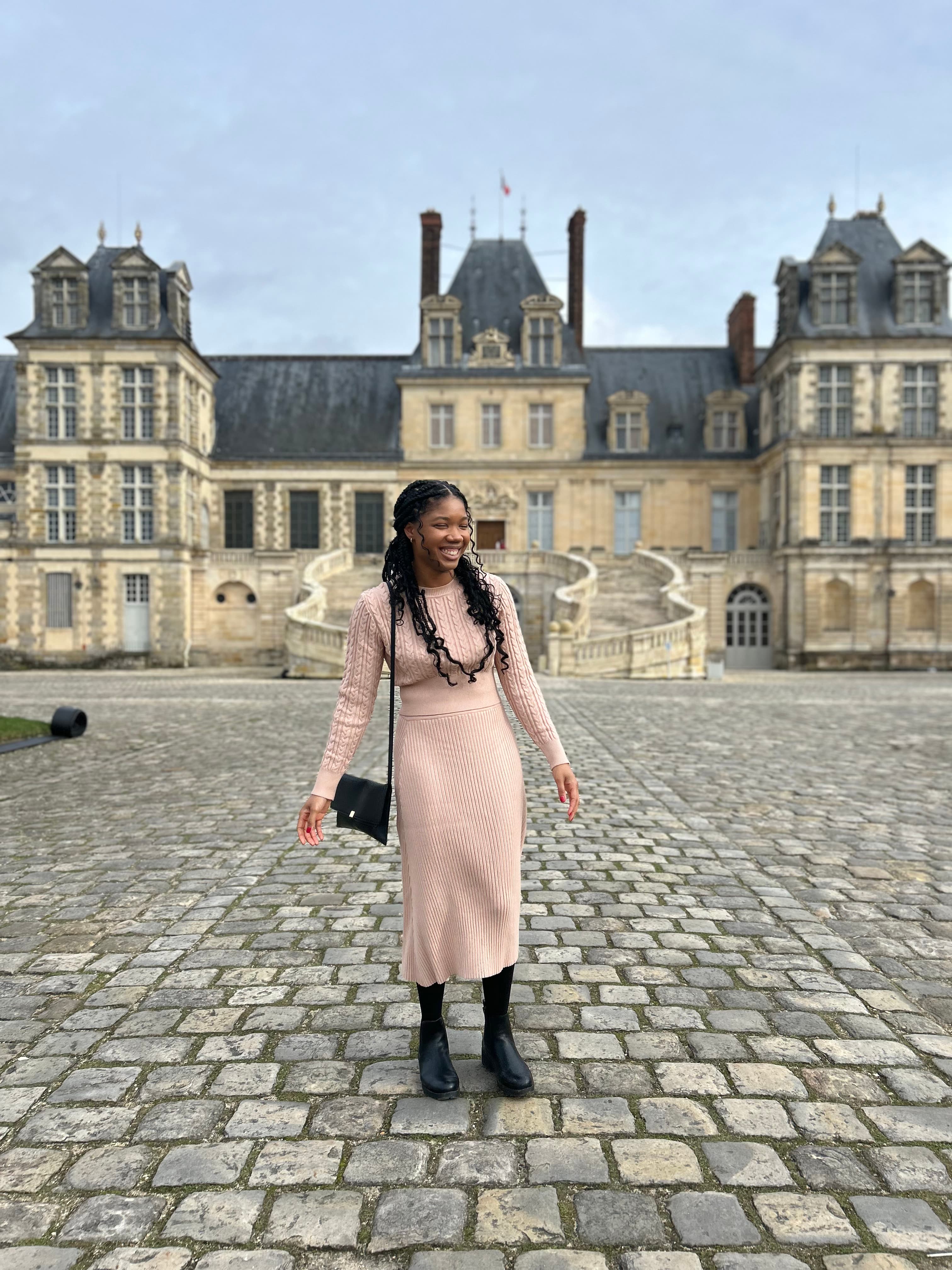 Posing for a picture at Château de Fontainebleau