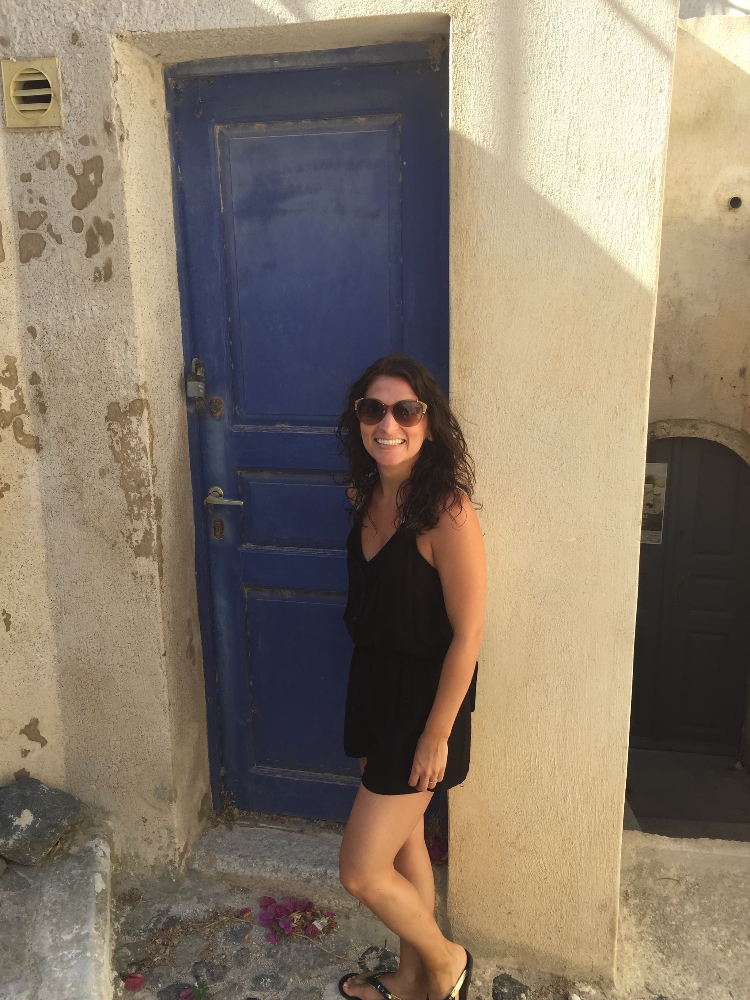 Picture of Toni in black dress with blue gate